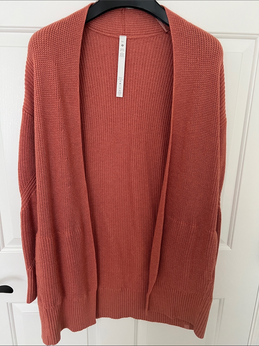 Lululemon - Cashlu Sweater Wrap
Colour Heathered Pink savannah M/L